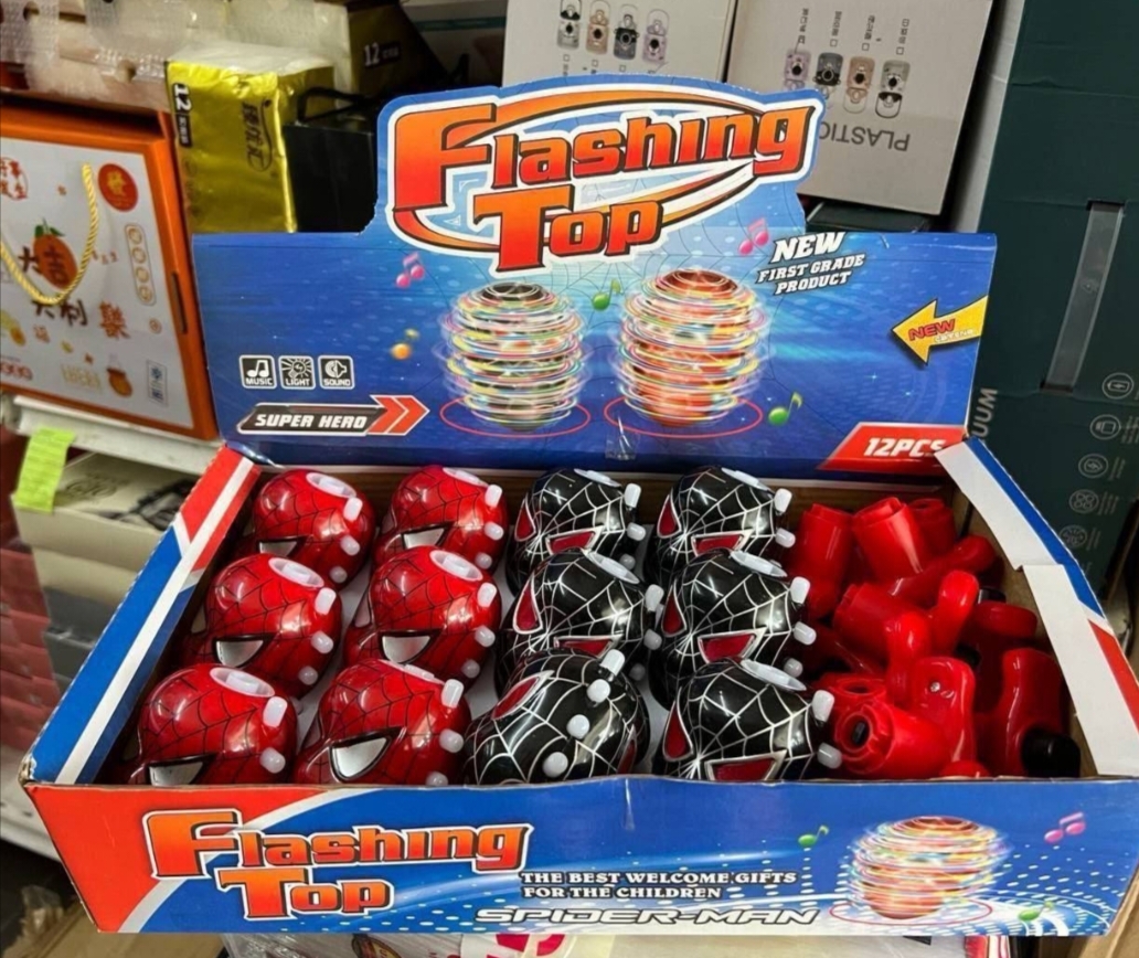 Gasing spinning flashing top
